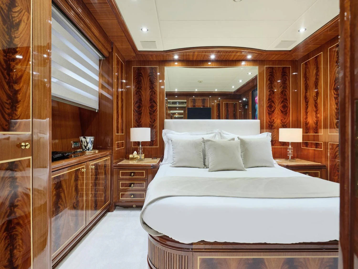 a large bed in a room aboard ABILITY Yacht for Sale
