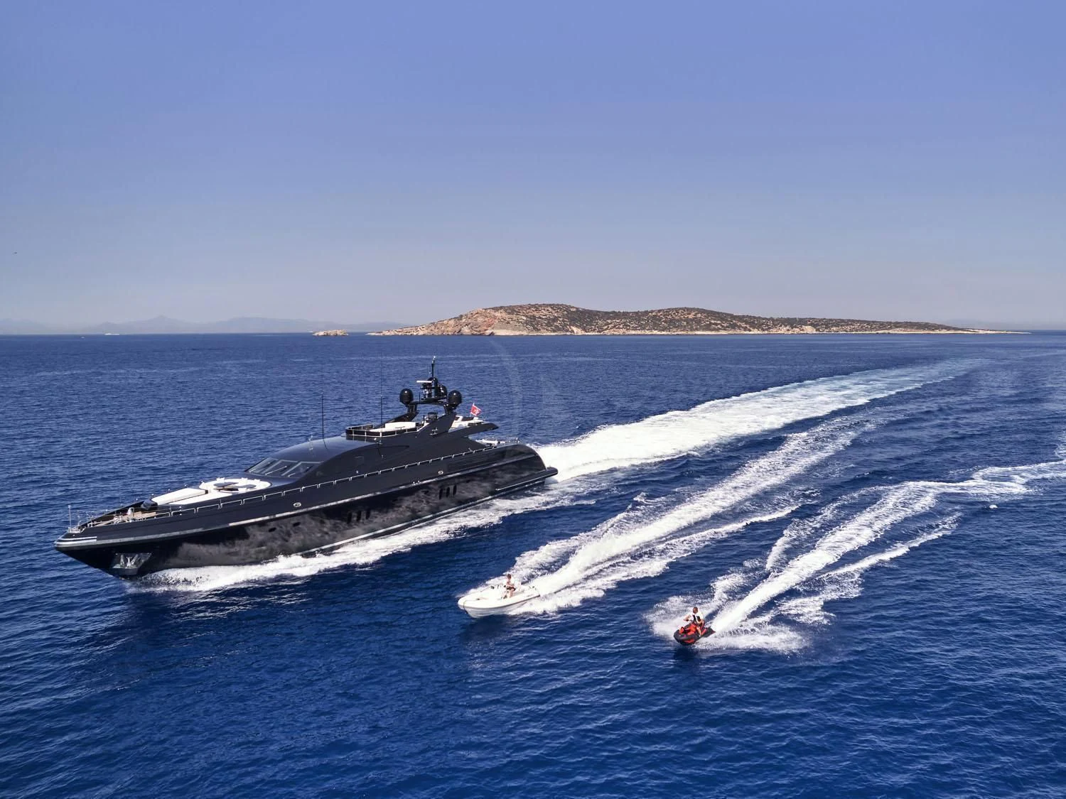 a military boat in the water aboard ABILITY Yacht for Sale