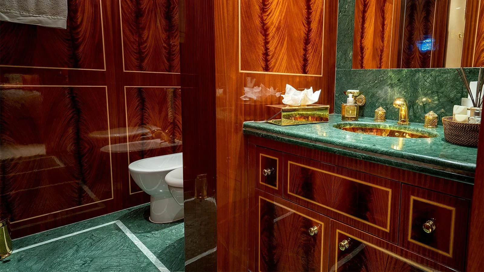 a bathroom with a sink and toilet aboard ABILITY Yacht for Sale