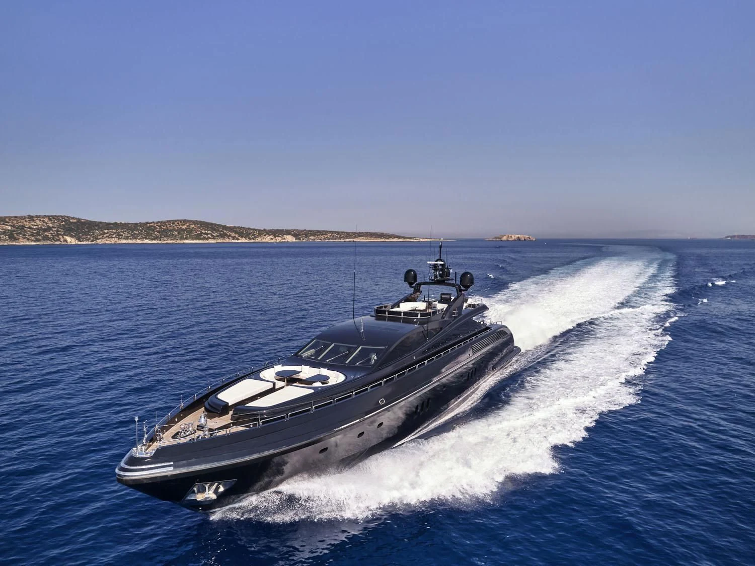 a military ship on the water aboard ABILITY Yacht for Sale