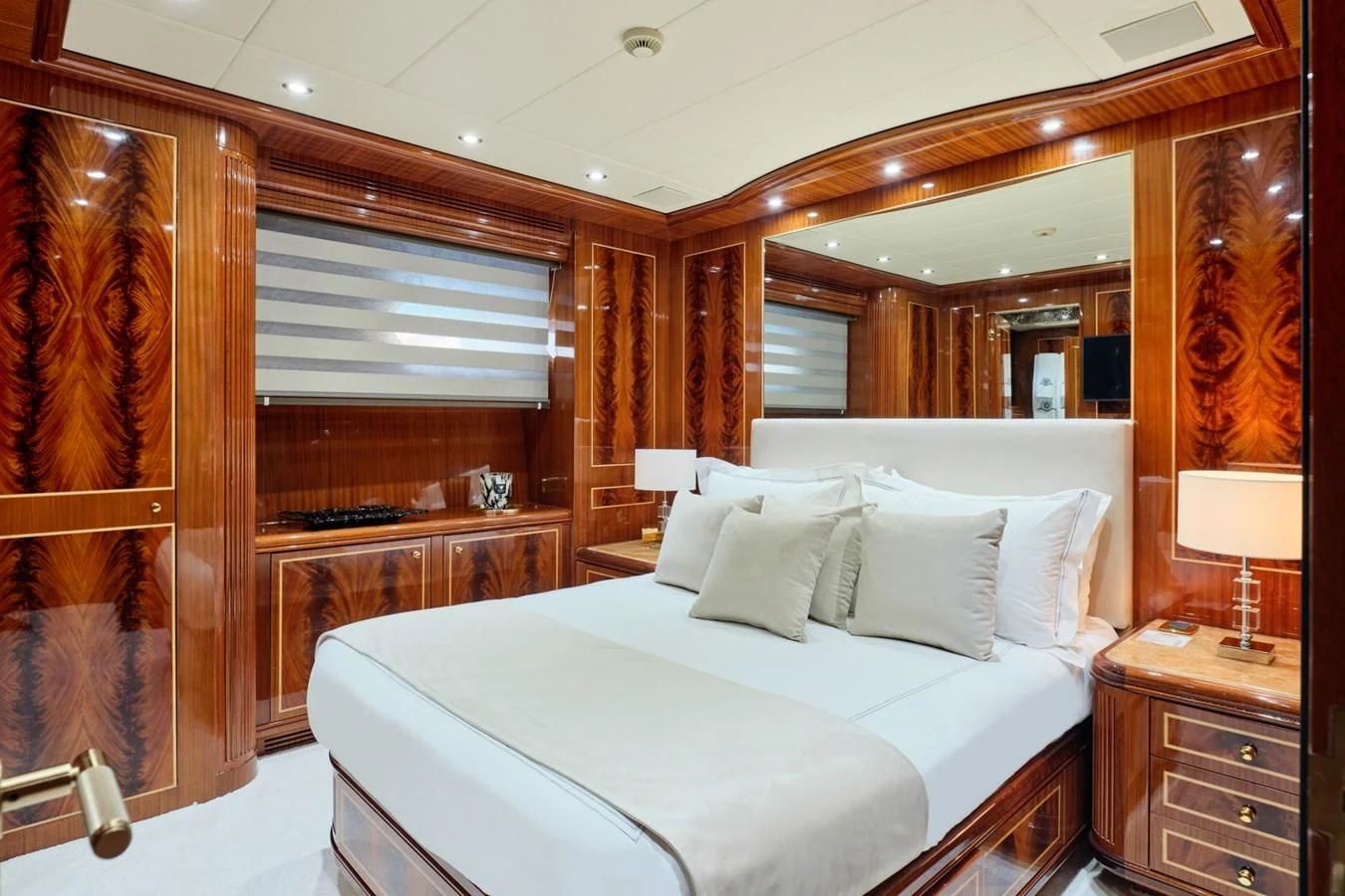 a bed in a room aboard ABILITY Yacht for Sale