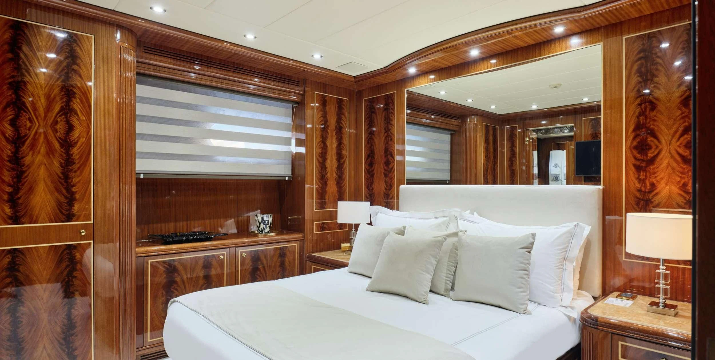 a hotel room with a bed aboard ABILITY Yacht for Sale