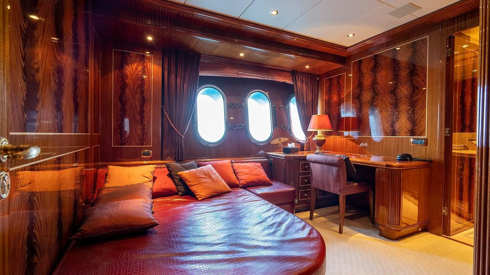 a large bed in a room aboard ABILITY Yacht for Sale