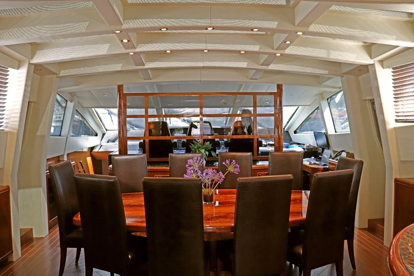 a room with a table and chairs aboard ABILITY Yacht for Sale