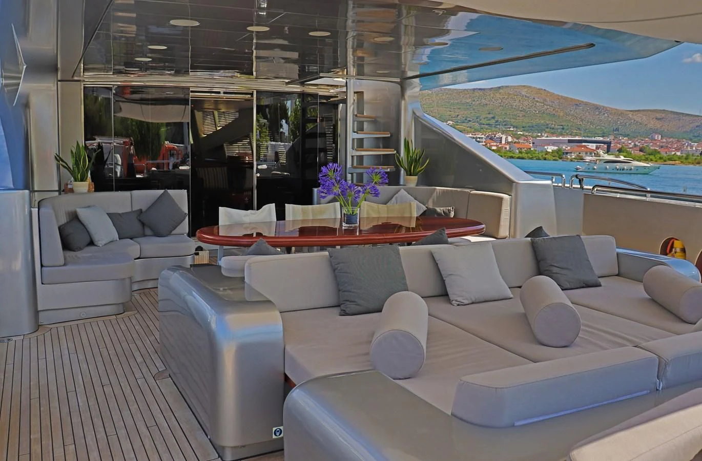 a room with couches and a pool aboard ABILITY Yacht for Sale