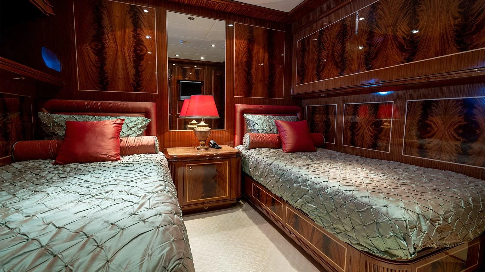 a room with two beds aboard ABILITY Yacht for Sale