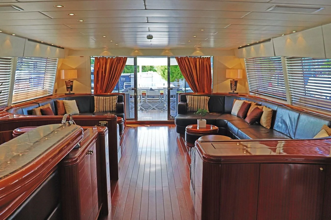 a large room with a couch and a table aboard ABILITY Yacht for Sale