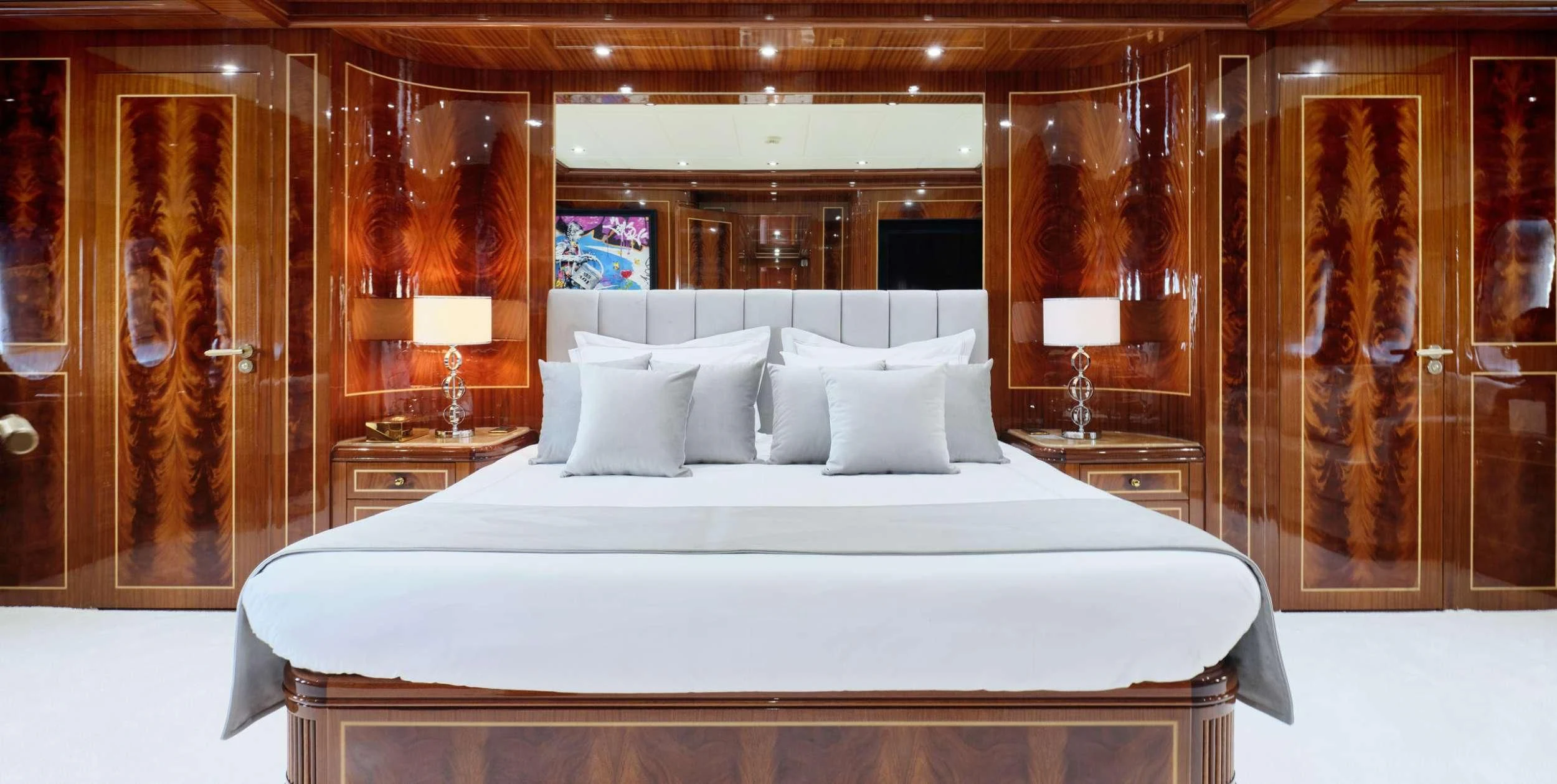 a large bed in a room aboard ABILITY Yacht for Sale