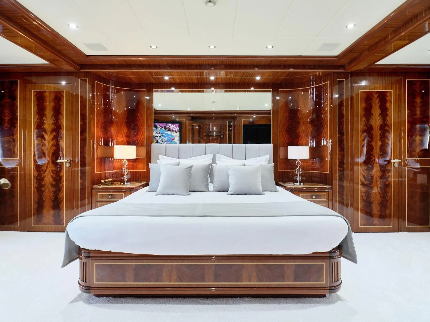 a large bed in a room aboard ABILITY Yacht for Sale
