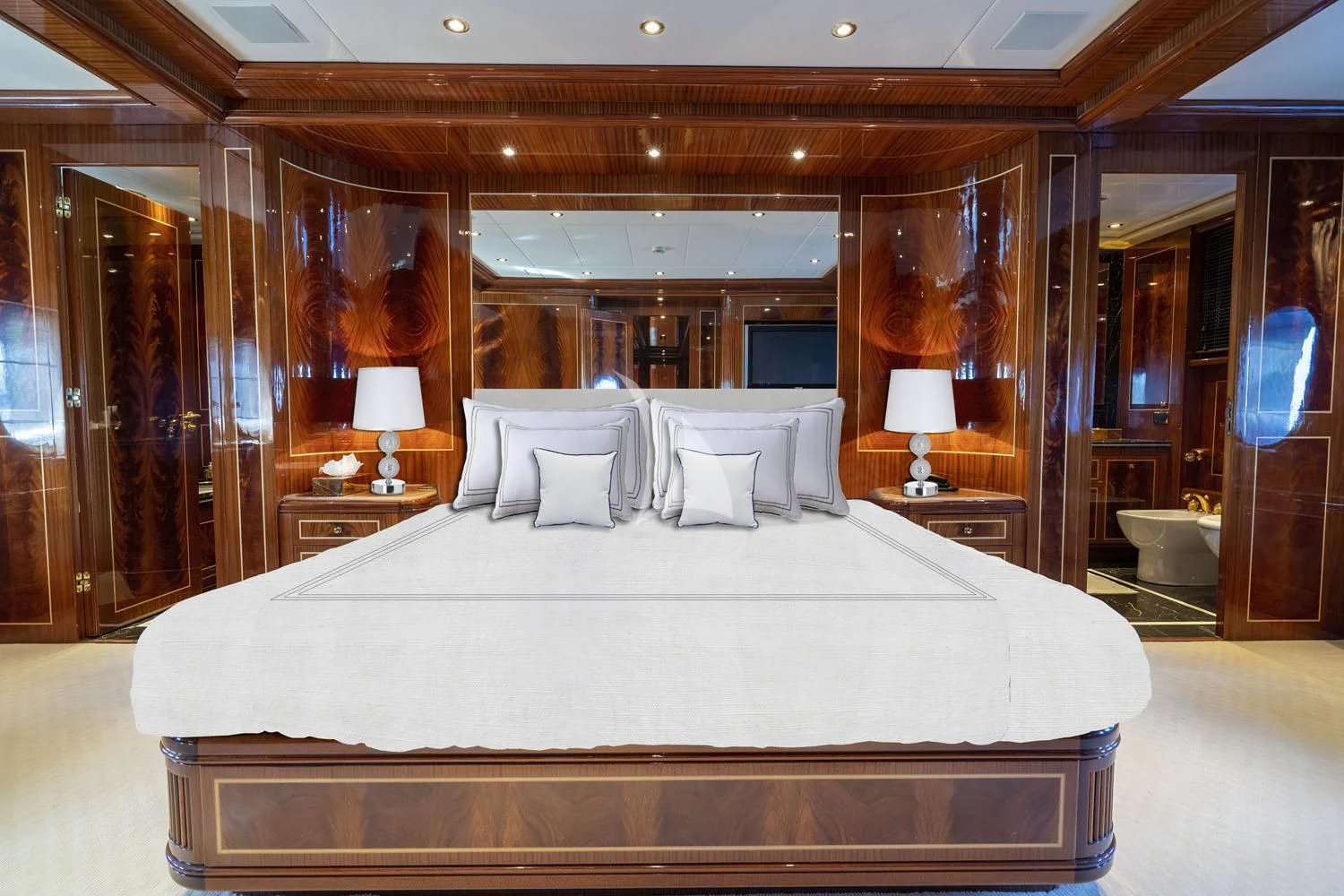 a large bed in a hotel room aboard ABILITY Yacht for Sale