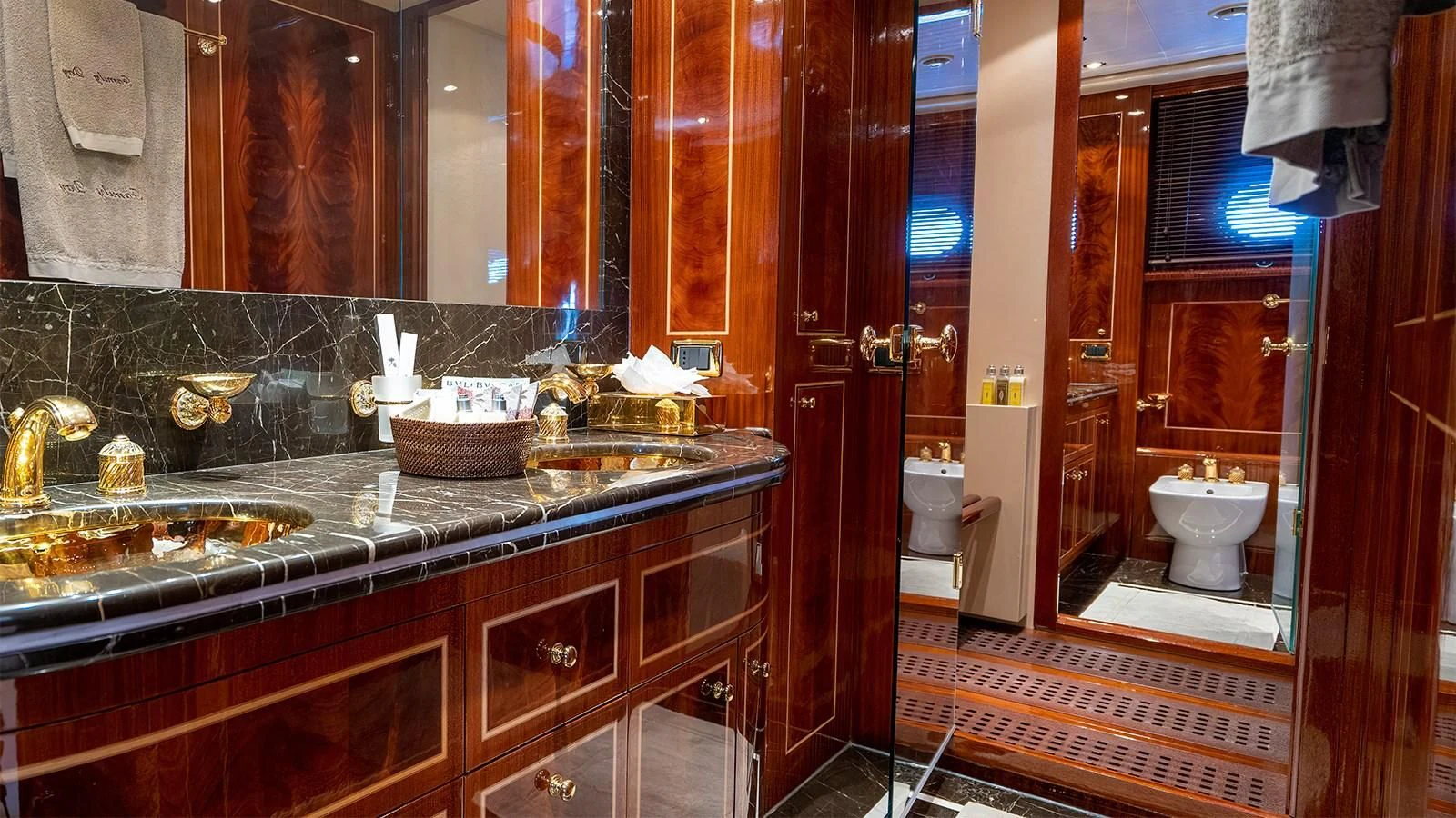 a bathroom with a countertop sink and a mirror aboard ABILITY Yacht for Sale