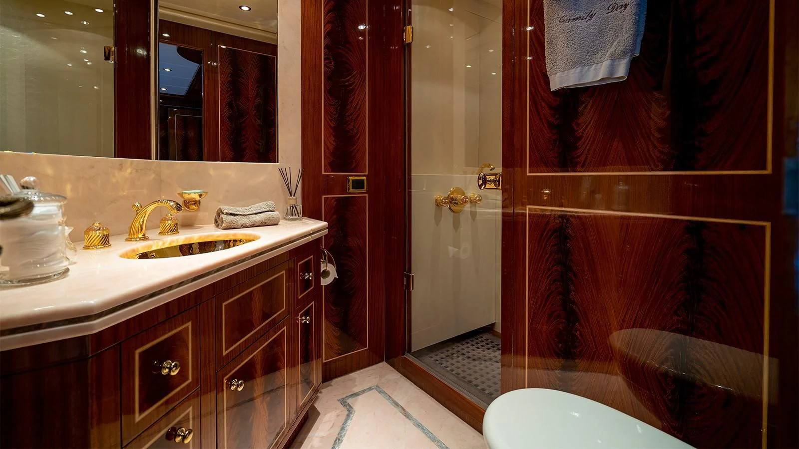 a bathroom with a sink and a mirror aboard ABILITY Yacht for Sale