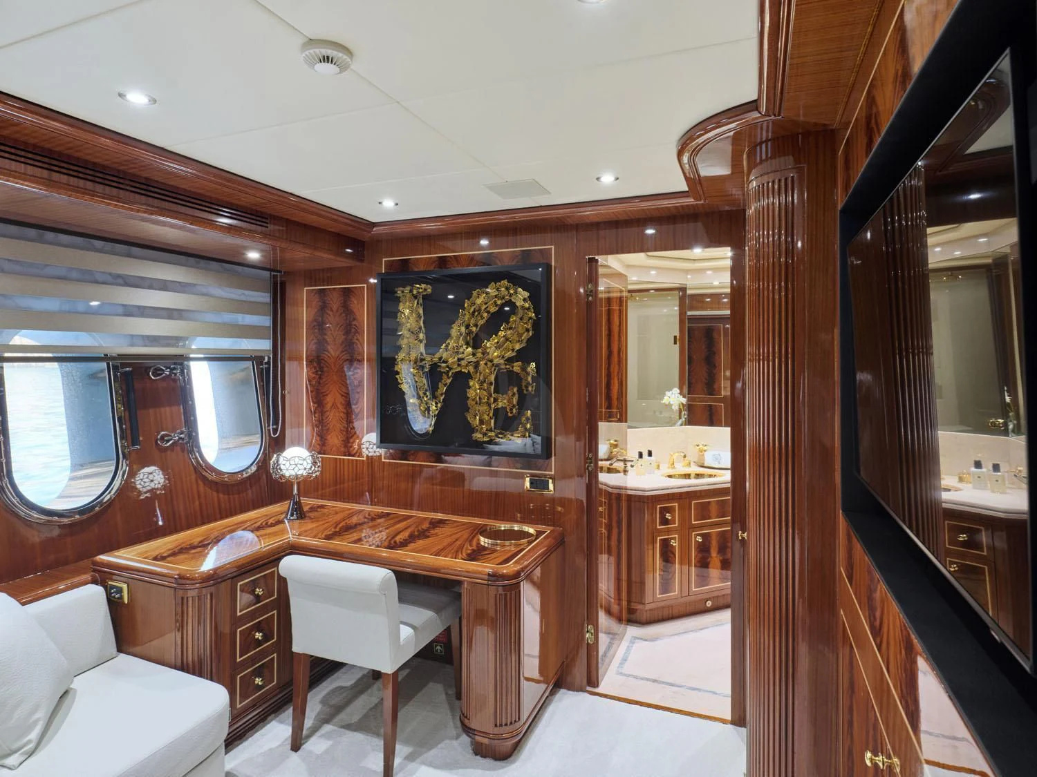 a room with a desk and a chair aboard ABILITY Yacht for Sale