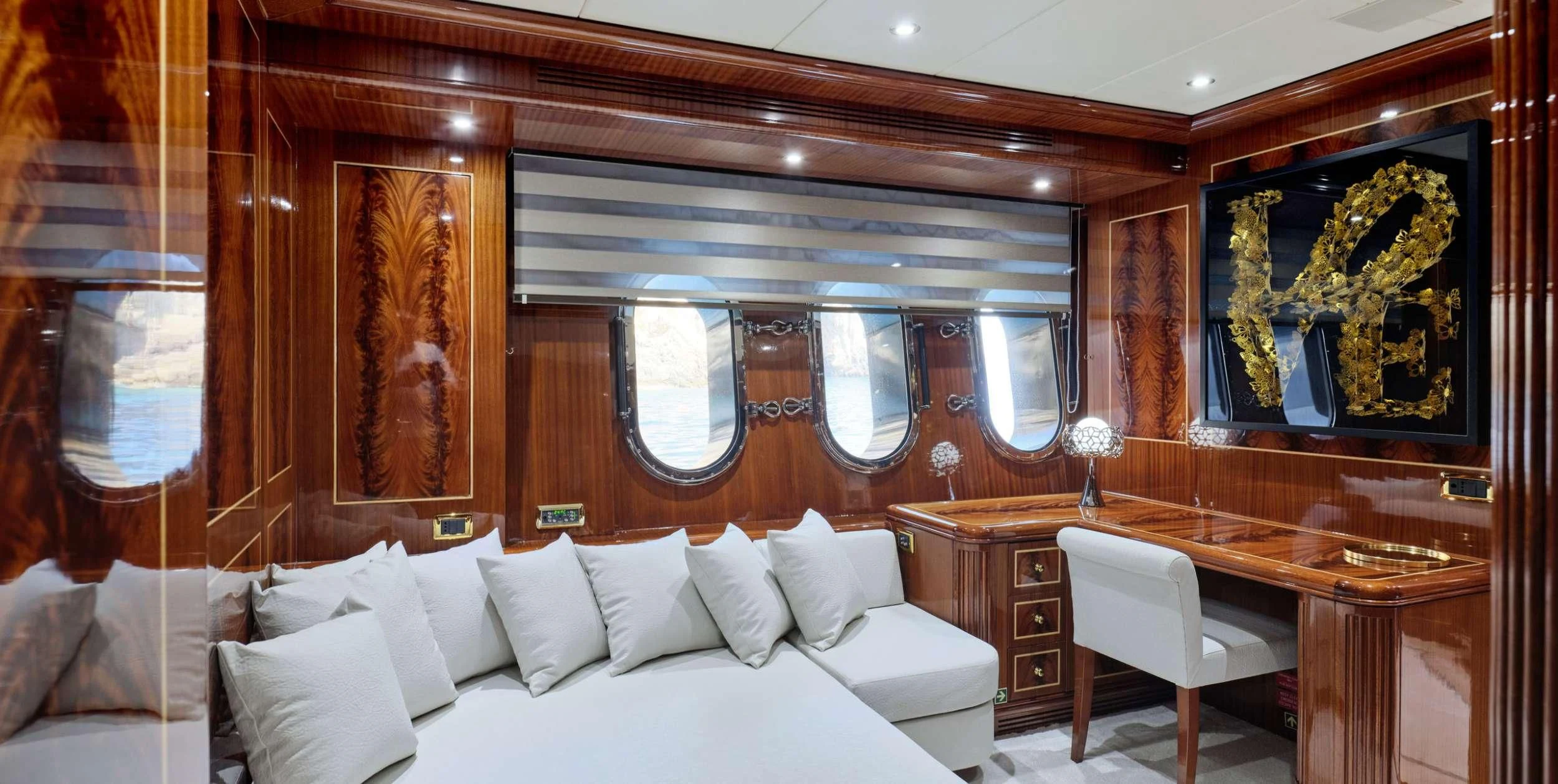 a room with a bed and a desk aboard ABILITY Yacht for Sale