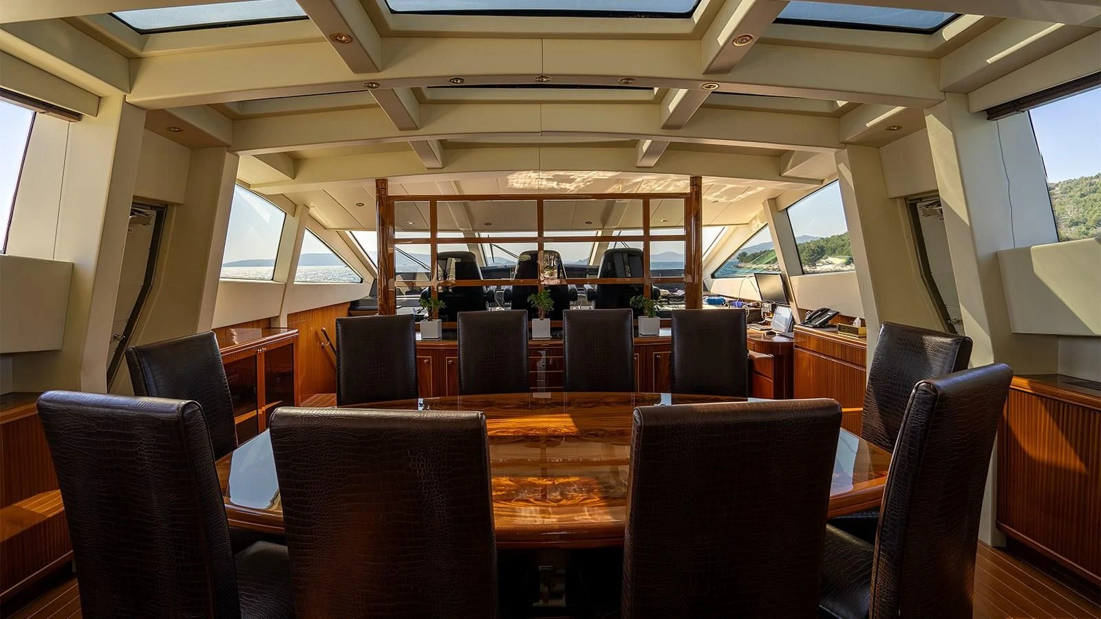 a room with chairs and a table aboard ABILITY Yacht for Sale