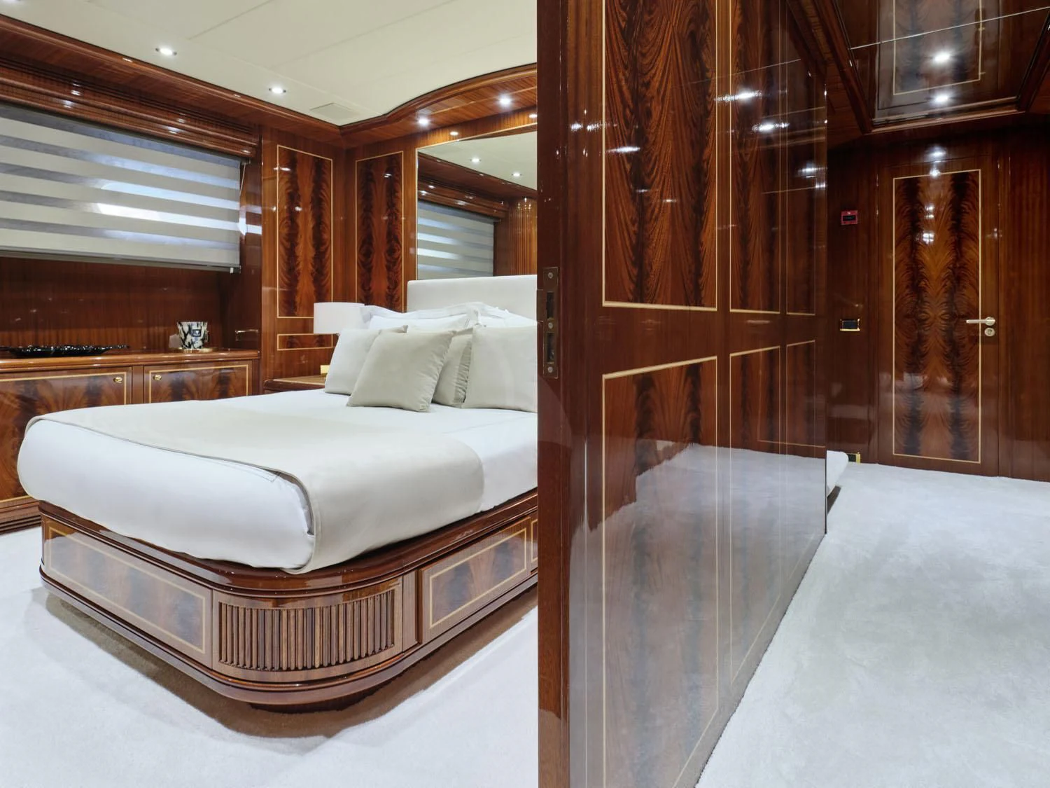 a bed in a room aboard ABILITY Yacht for Sale