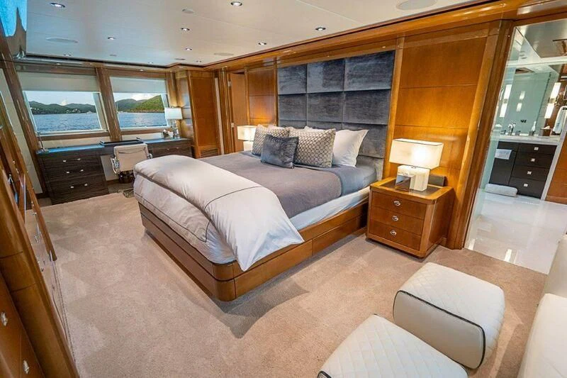 a large bedroom with a bed aboard SEANASH Yacht for Sale