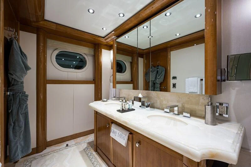 a bathroom with a large mirror aboard SEANASH Yacht for Sale