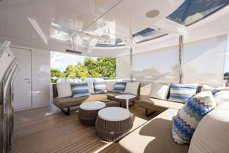 a living room with a large window aboard SEANASH Yacht for Sale