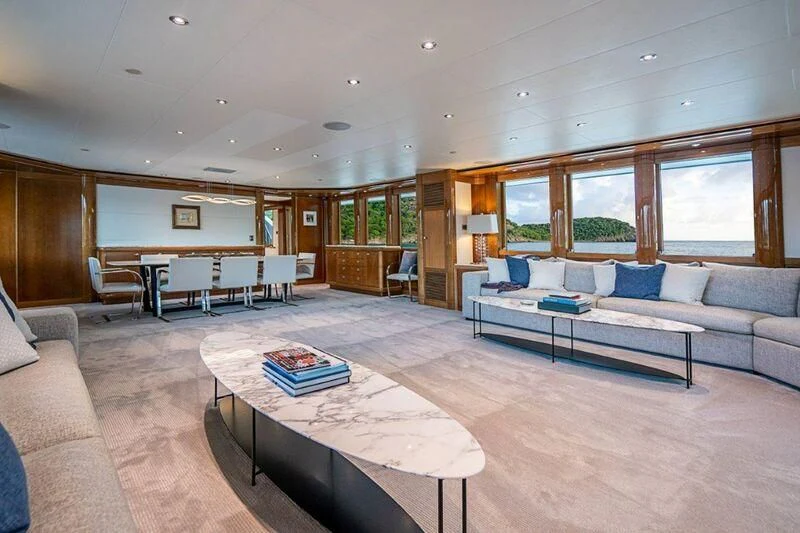 a living room with a couch and a coffee table aboard SEANASH Yacht for Sale