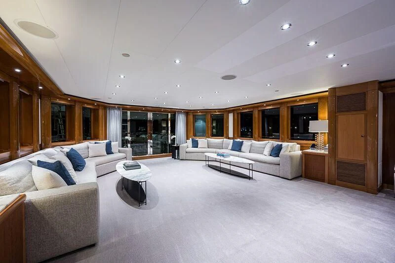 a living room with a couch and a table aboard SEANASH Yacht for Sale