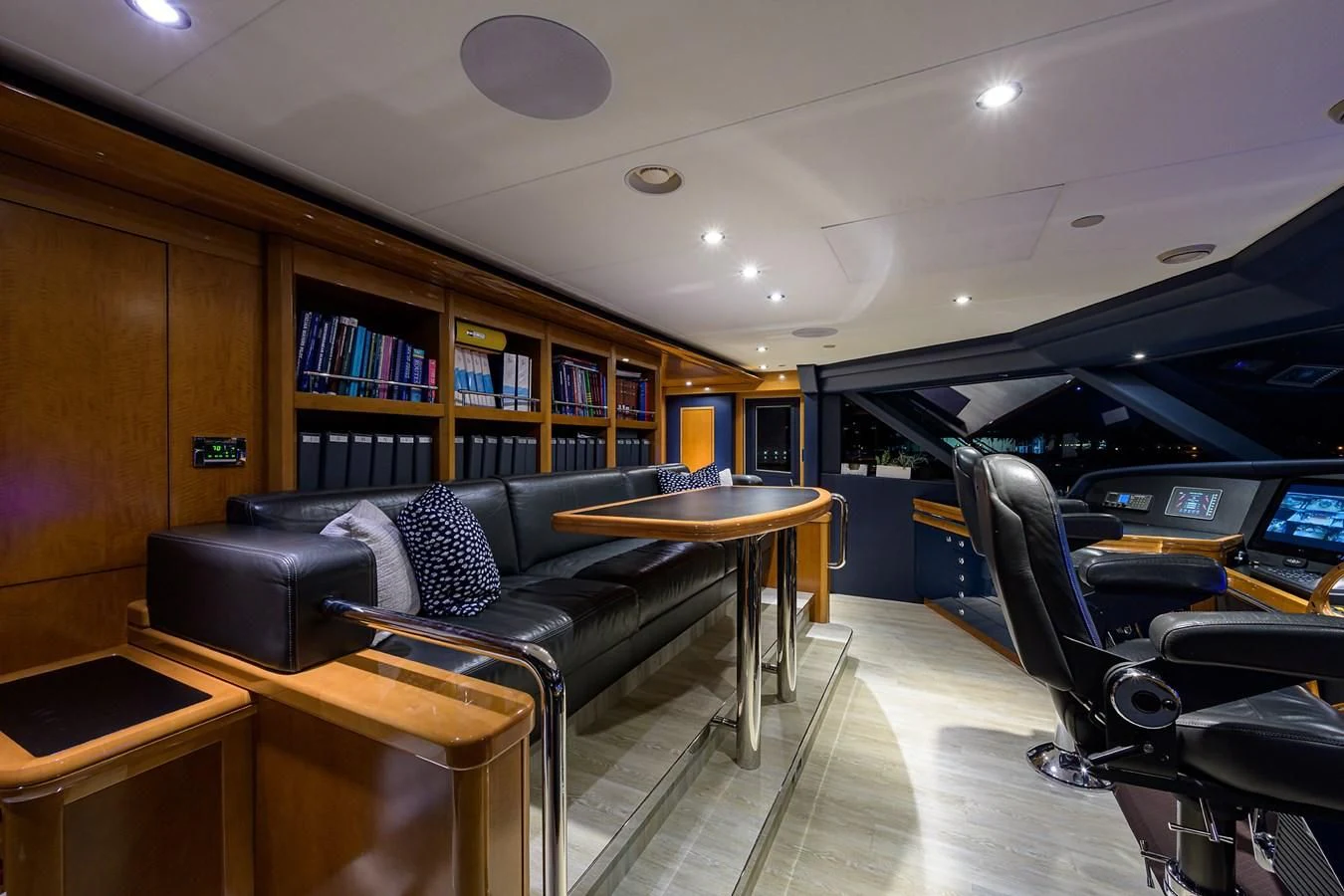 a room with a couch and a table and chairs aboard SEANASH Yacht for Sale
