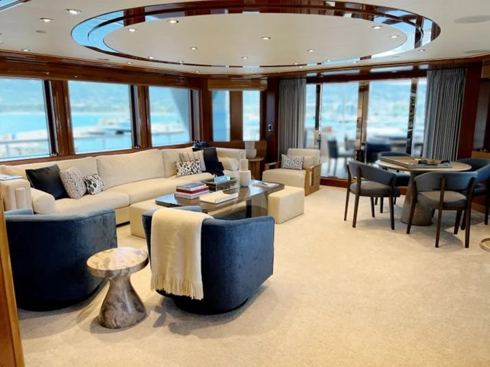 a living room with a large window aboard SEANASH Yacht for Sale