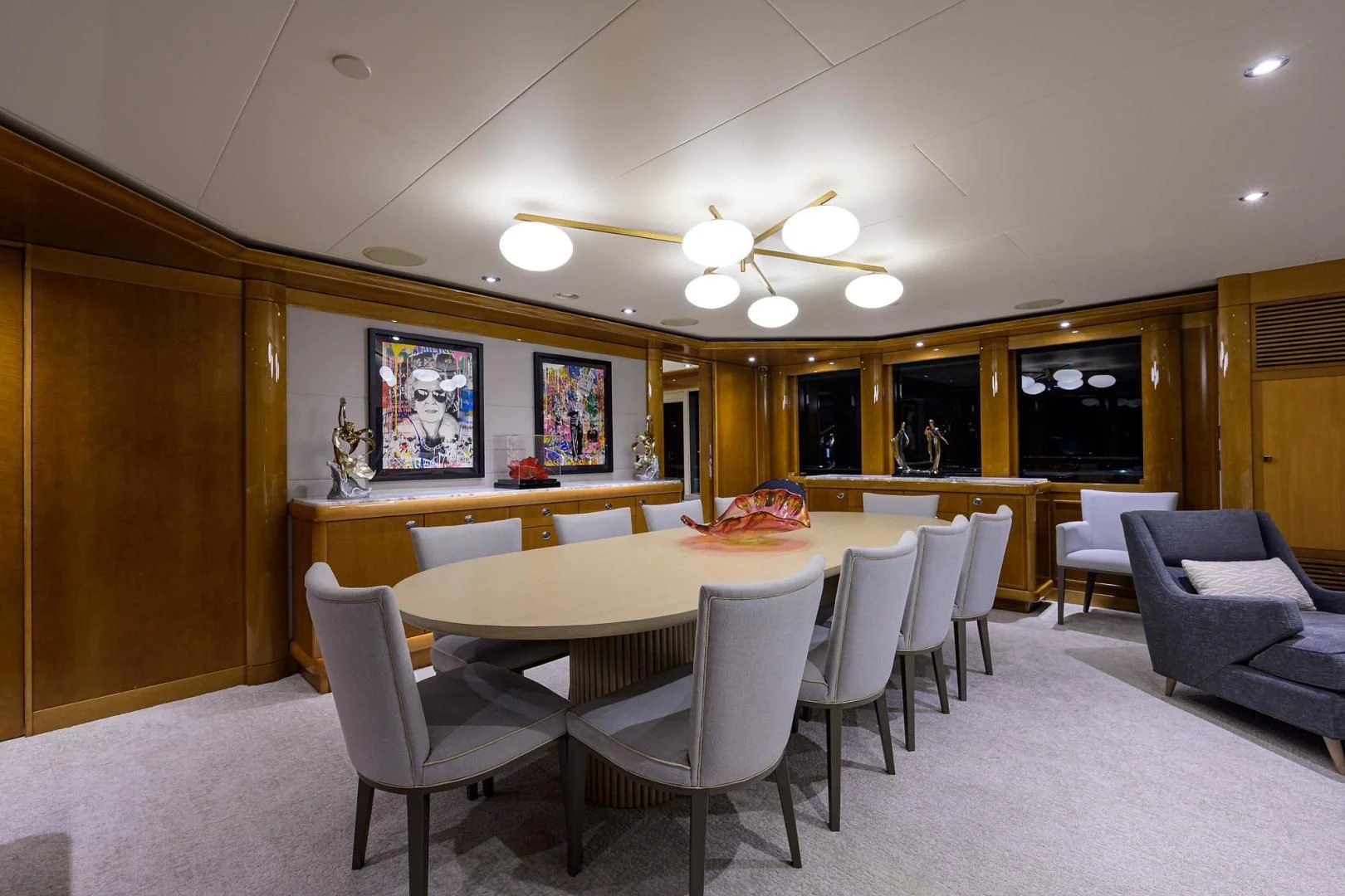 a room with a table and chairs aboard SEANASH Yacht for Sale