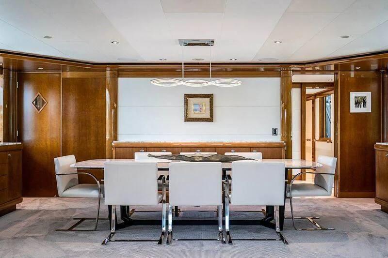 a room with chairs and a table aboard SEANASH Yacht for Sale