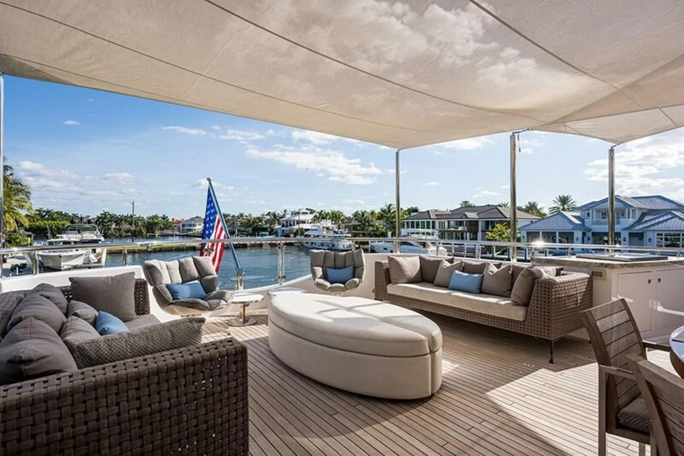 a patio with a large body of water and a large blue sky aboard SEANASH Yacht for Sale
