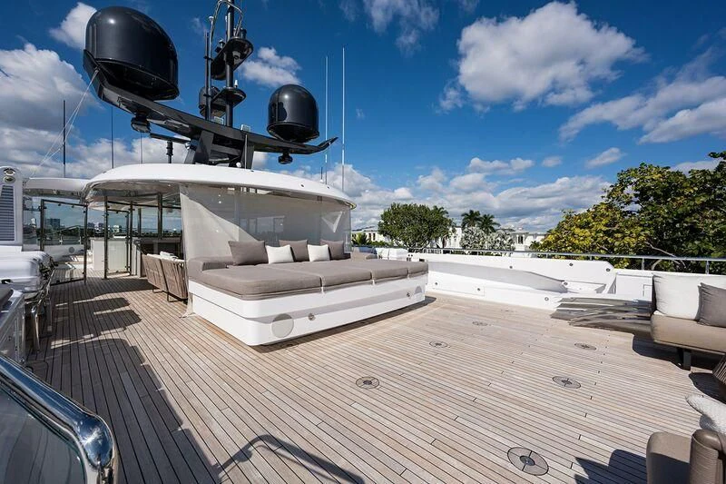 a white boat on a deck aboard SEANASH Yacht for Sale
