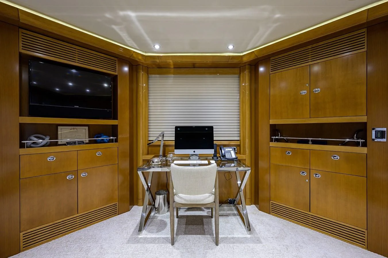 a room with a desk and a computer aboard SEANASH Yacht for Sale