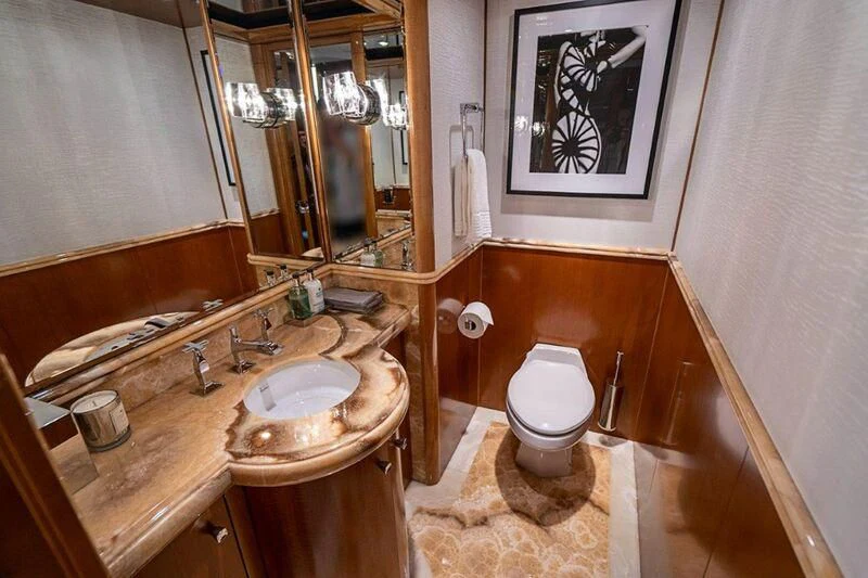 a bathroom with a sink and toilet aboard SEANASH Yacht for Sale