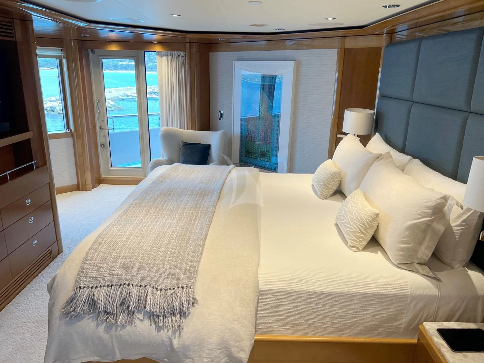 a bed with white sheets aboard SEANASH Yacht for Sale