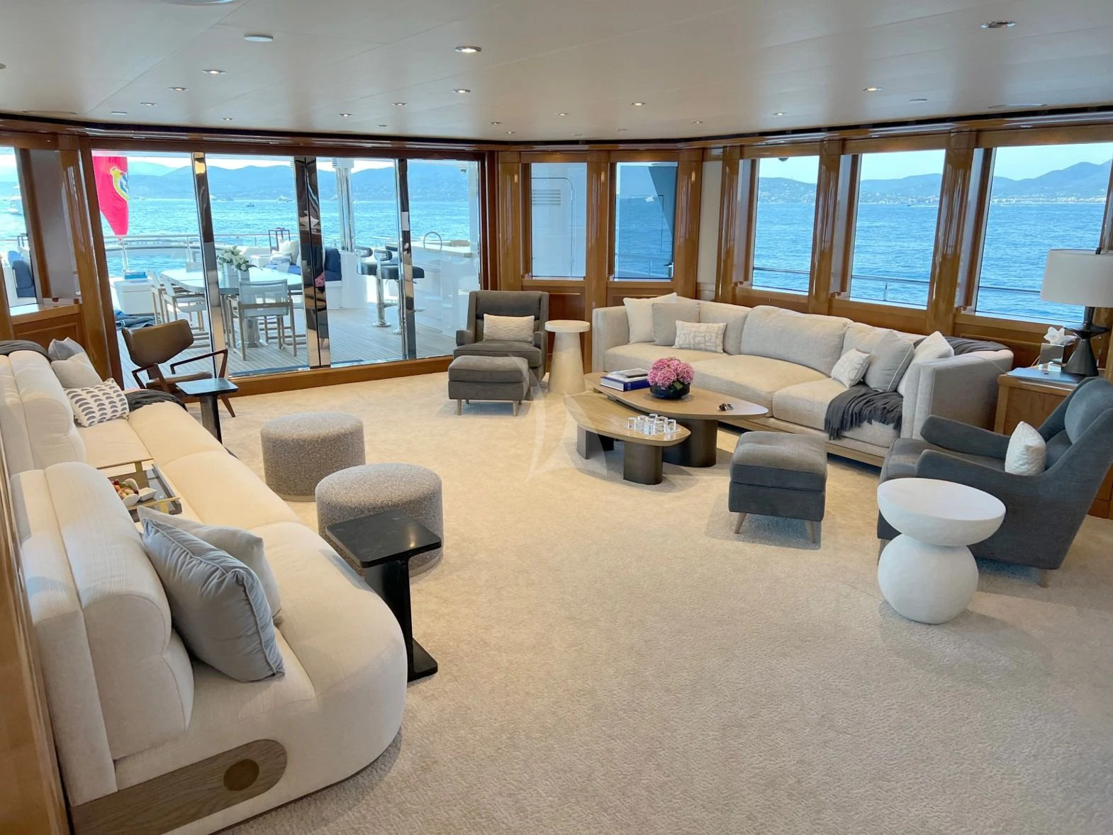 a living room with a large window aboard SEANASH Yacht for Sale