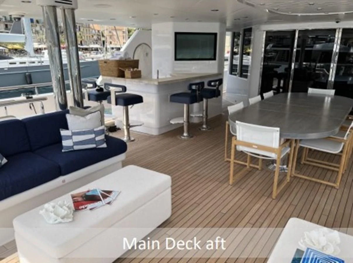 a room with a couch and a table aboard SEANASH Yacht for Sale