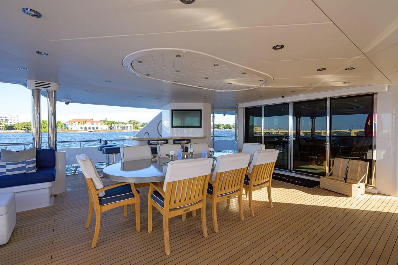 a room with a table and chairs aboard SEANASH Yacht for Sale