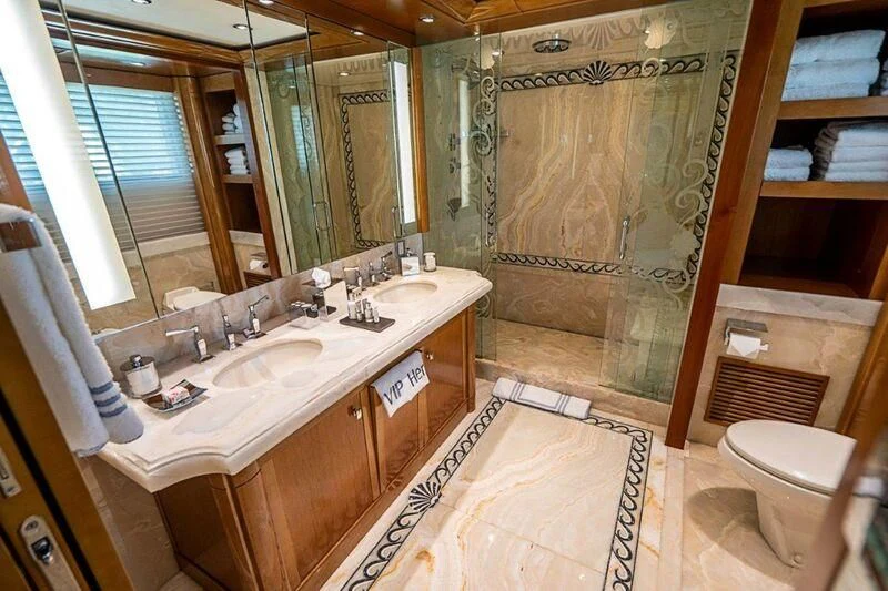 a bathroom with a sink and a toilet aboard SEANASH Yacht for Sale