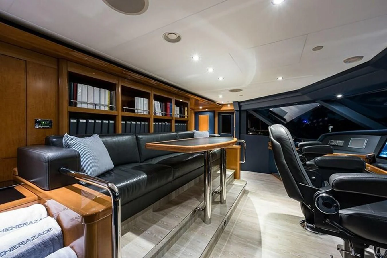 a living room with a couch and a table aboard SEANASH Yacht for Sale