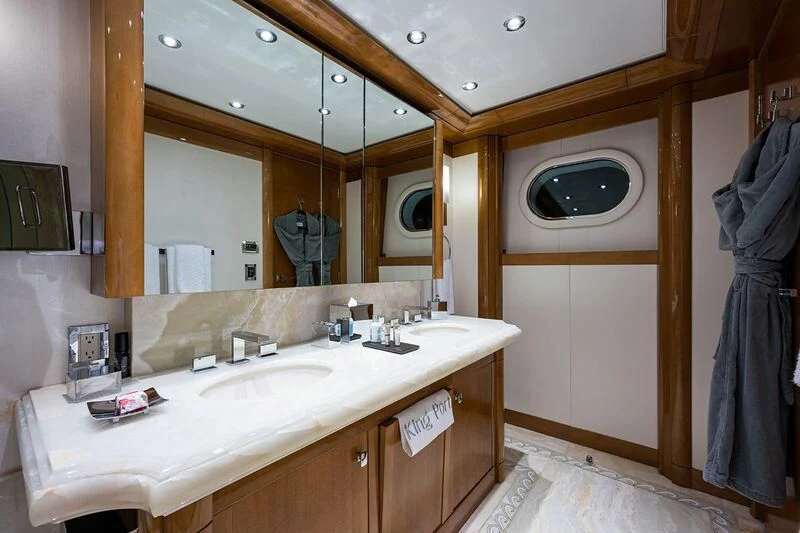 a bathroom with a mirror aboard SEANASH Yacht for Sale