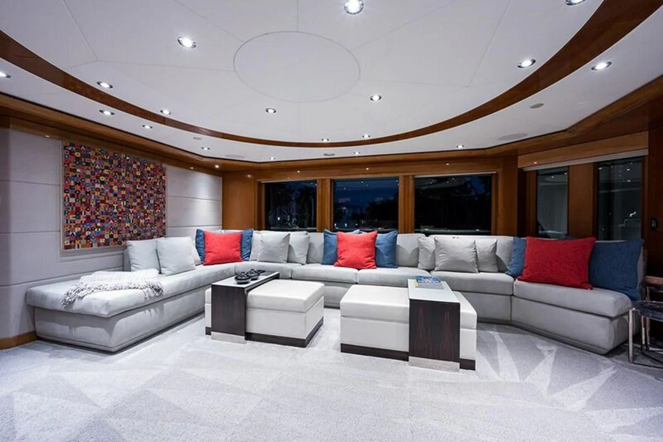a large living room with a large white sofa and a large white sofa aboard SEANASH Yacht for Sale