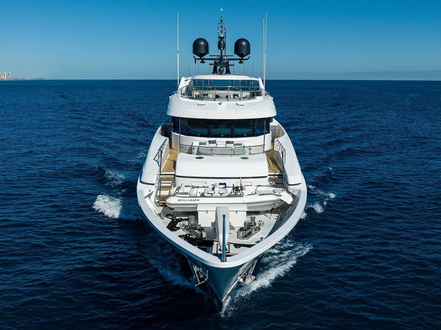 a white boat in the water aboard SEANASH Yacht for Sale
