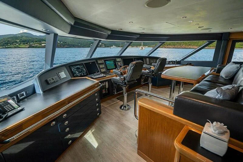 a room with a view of the ocean and the deck aboard SEANASH Yacht for Sale
