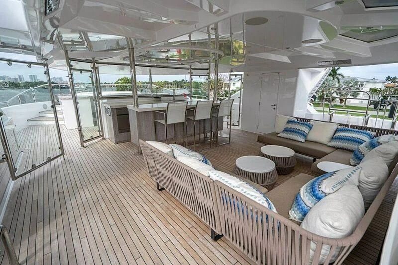 a large living room with a large balcony aboard SEANASH Yacht for Sale