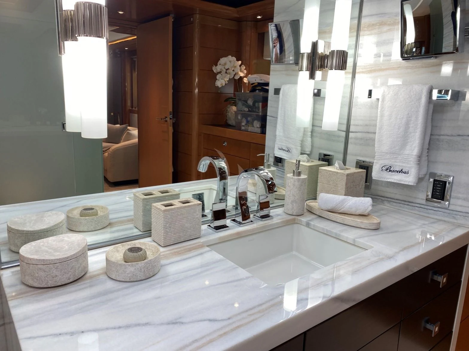 a bathroom with a large mirror aboard SEANASH Yacht for Sale