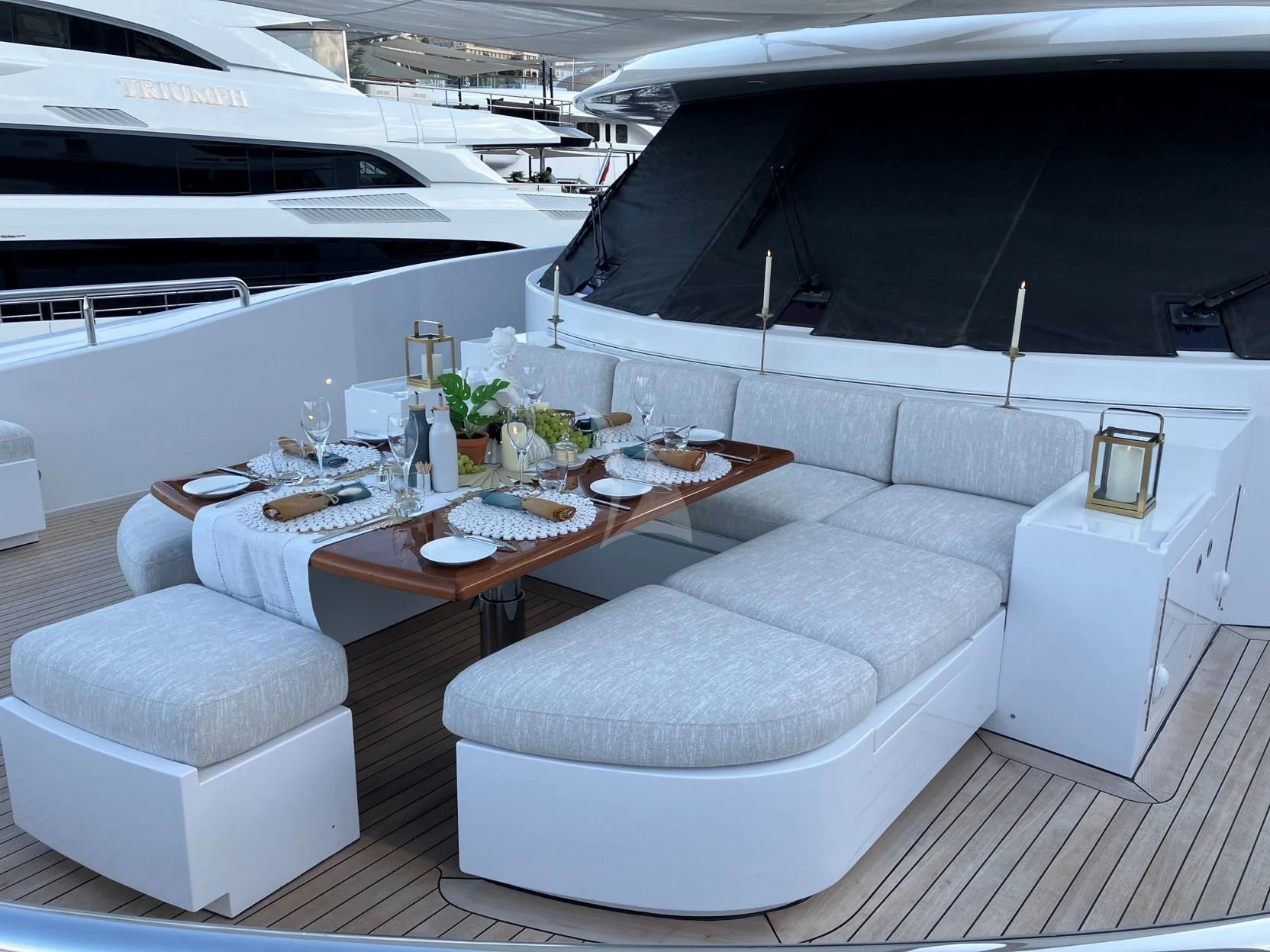 a white couch and table in a room aboard SEANASH Yacht for Sale