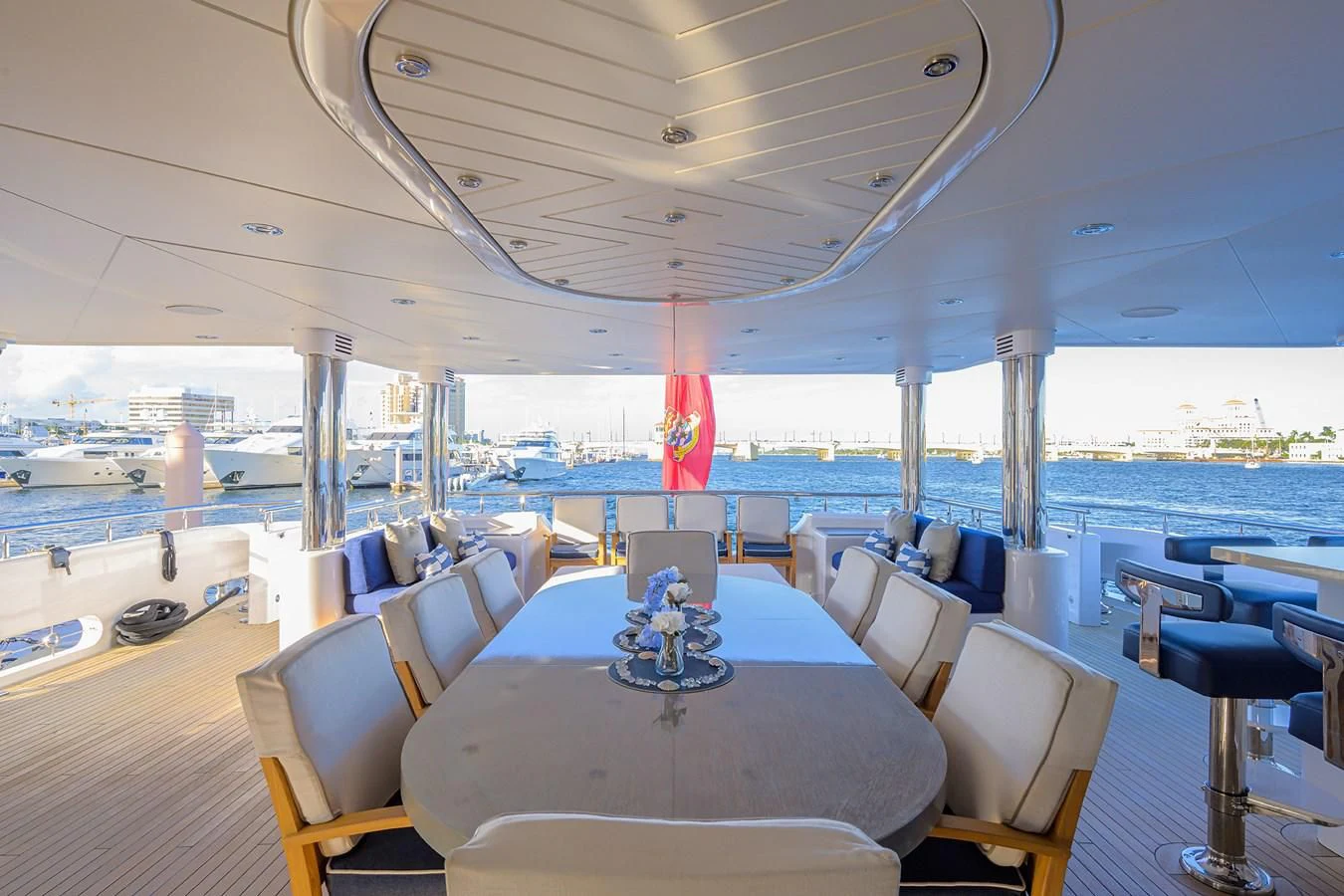 a large room with a table and chairs aboard SEANASH Yacht for Sale