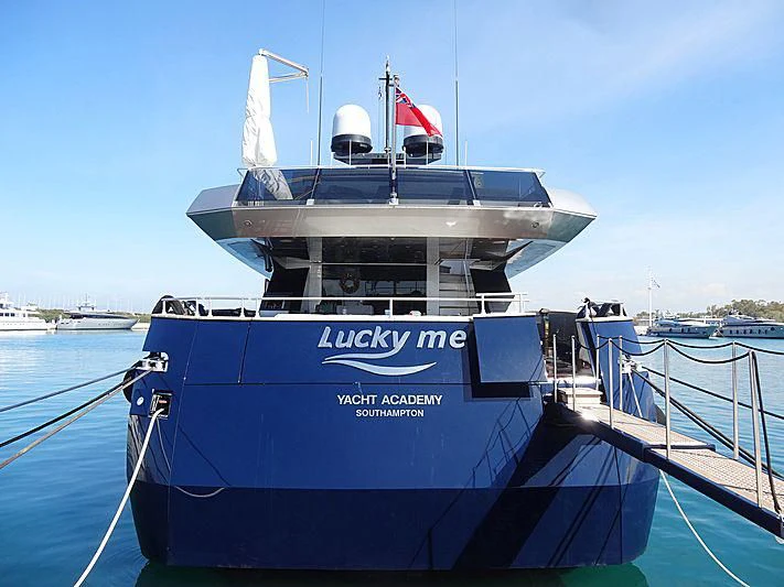 a large boat in the water aboard LUCKY ME YACHT ACADEMY Yacht for Sale