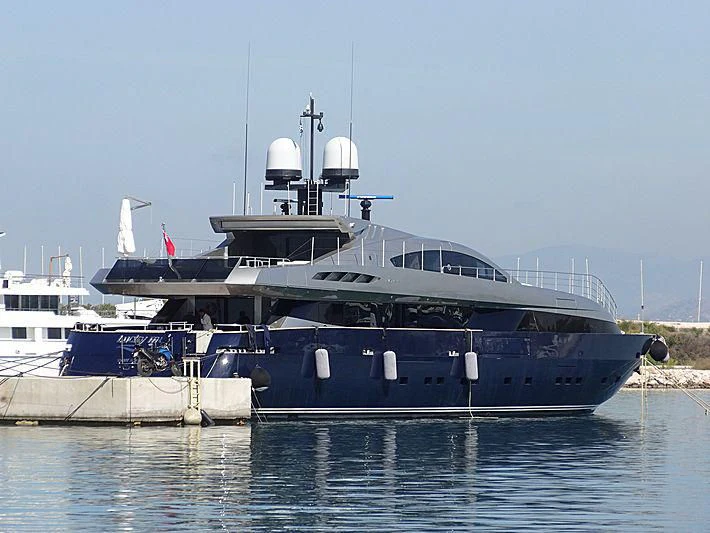 a large boat docked at a pier aboard LUCKY ME YACHT ACADEMY Yacht for Sale