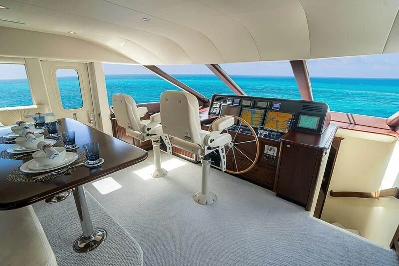 a room with a desk and computer aboard BOOGIE BABE IV Yacht for Sale